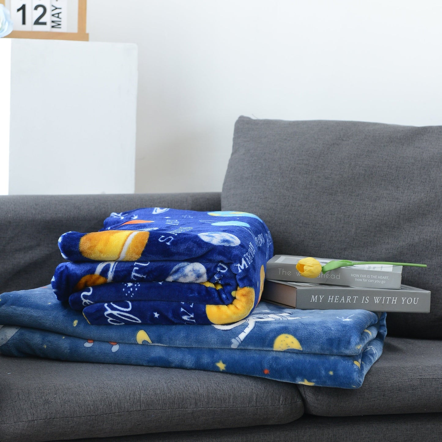 Warm and soft Cozy Astronaut Flannel Throw Blanket with Space Theme - Reversible for couch, bed, office, and travel. Perfect for galaxy lovers, nap time, and adding a touch of mission and wavering style to any space.