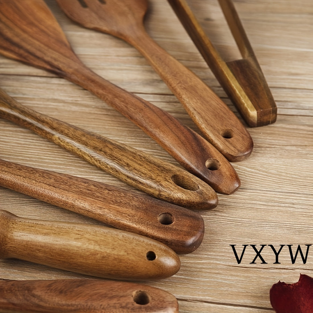 Set of 7 wooden utensils for cooking, including spoons and spatulas. This safety non-stick cookware set is an essential addition to your kitchen gadgets and accessories.