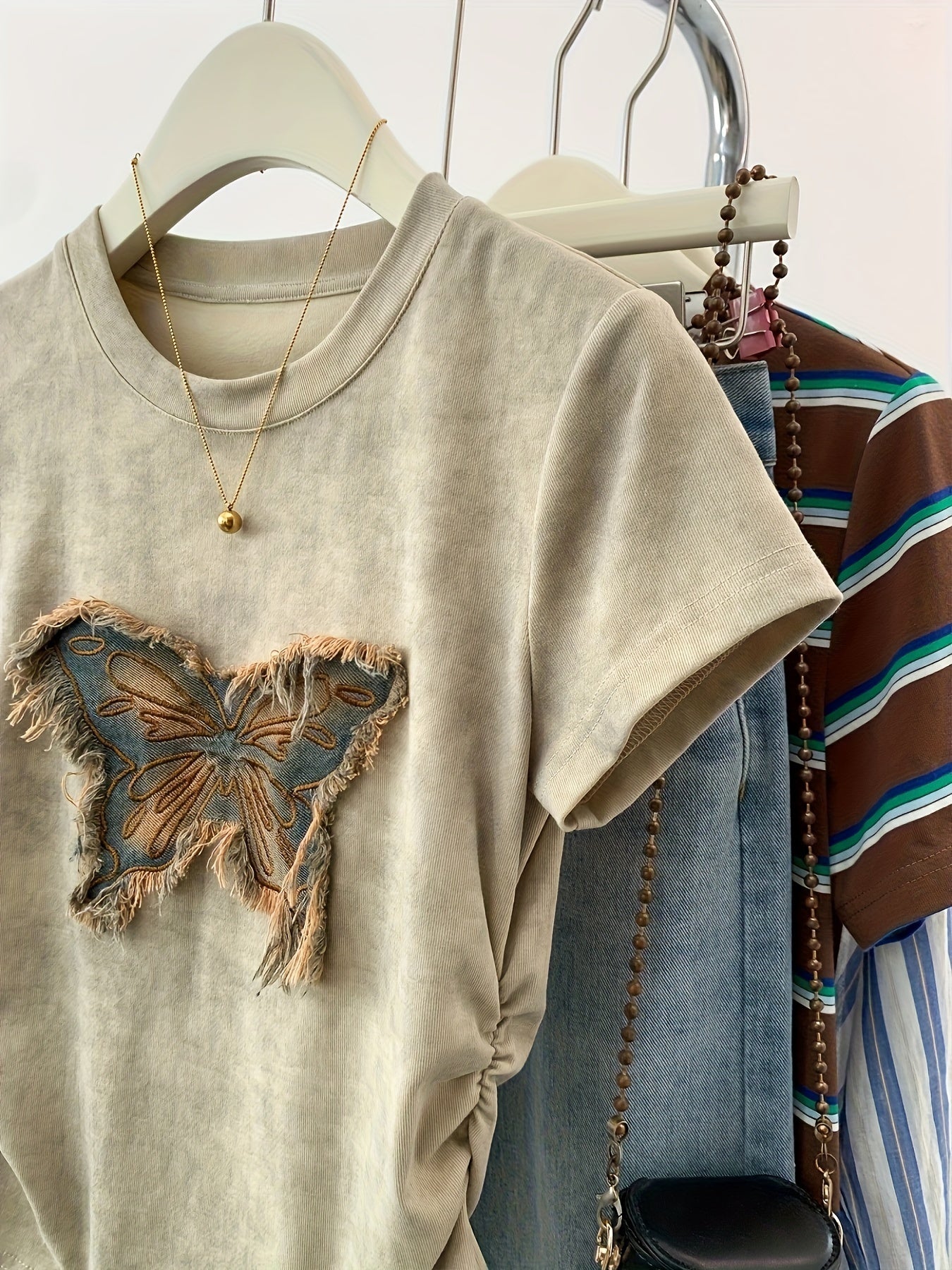 Short sleeve butterfly patch t-shirt for spring and summer. Casual crew neck top for women.