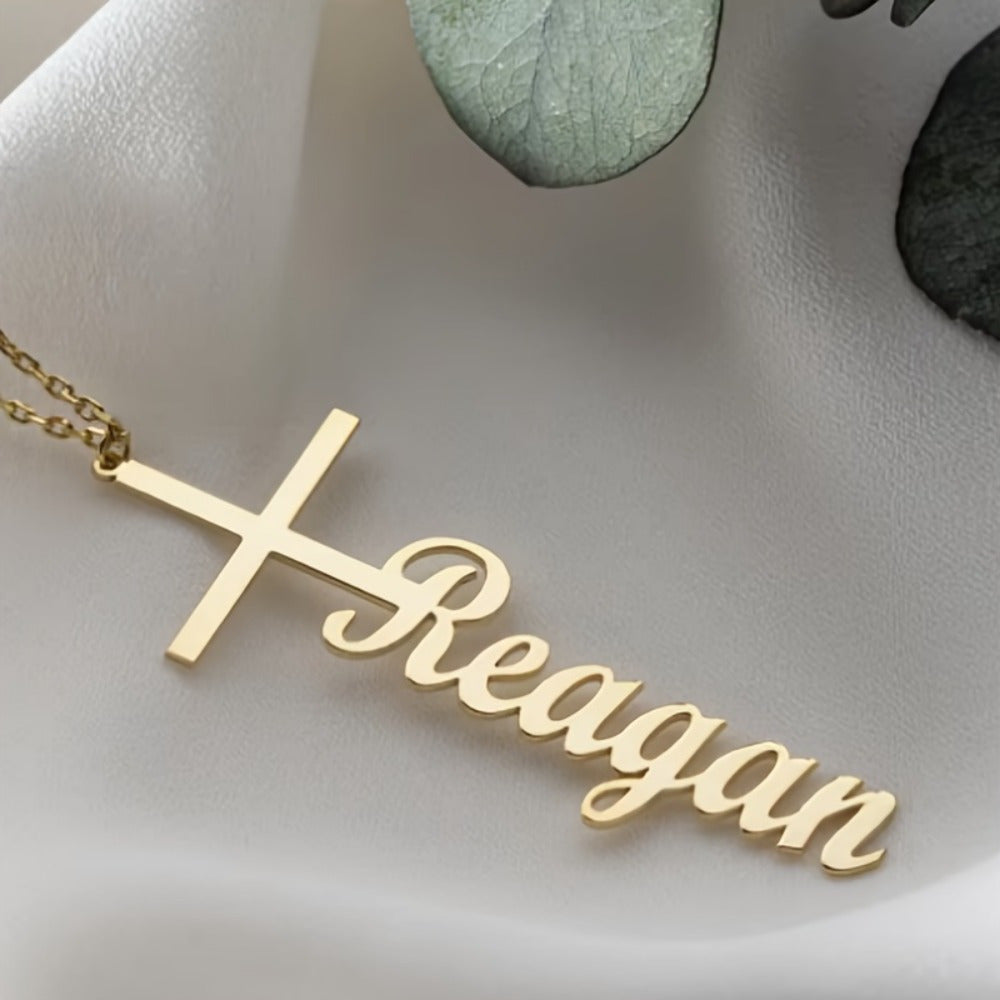 Personalize a name necklace pendant featuring a Middle Eastern style cross. Crafted with elegant stainless steel, this piece is perfect for everyday wear or music festivals. Share warm messages at parties or on vacation with this trendy and elegant