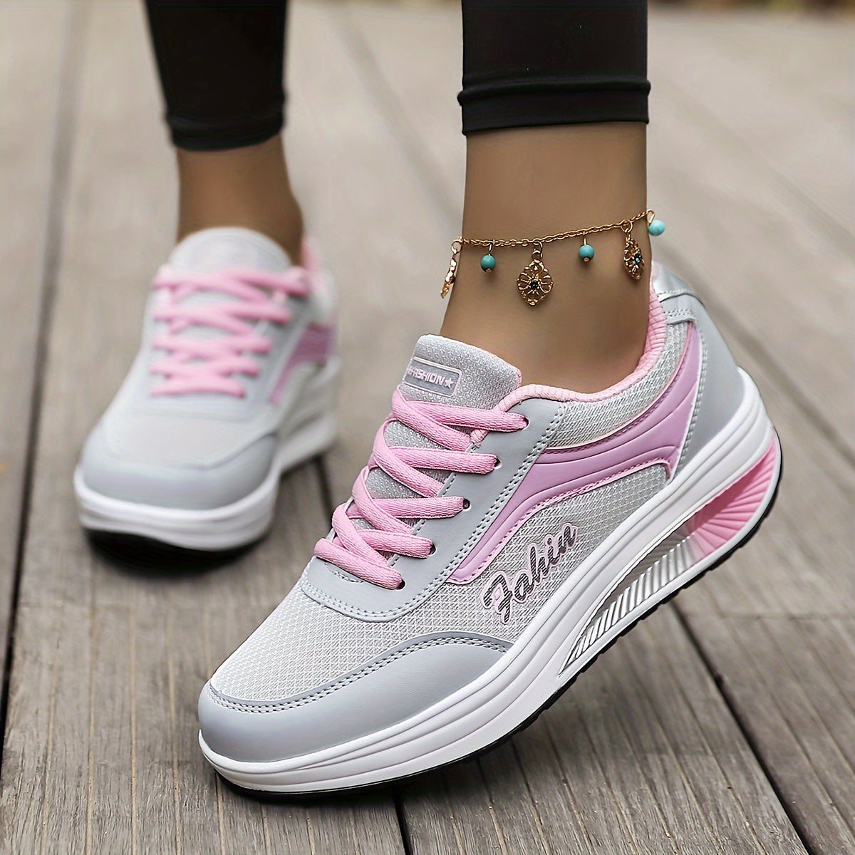 Women's platform sneakers with breathable mesh, lace-up design, and comfortable fit in plus size