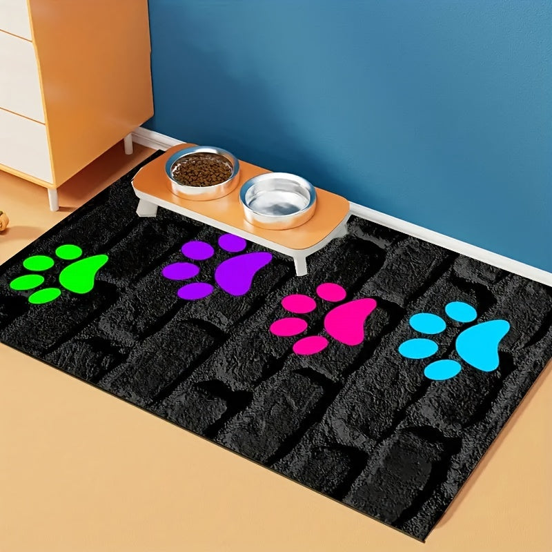 Cute paw print pet feeding mat for indoor/outdoor use, non-slip polyester material, versatile all-seasons accessory for pet food & water bowls.