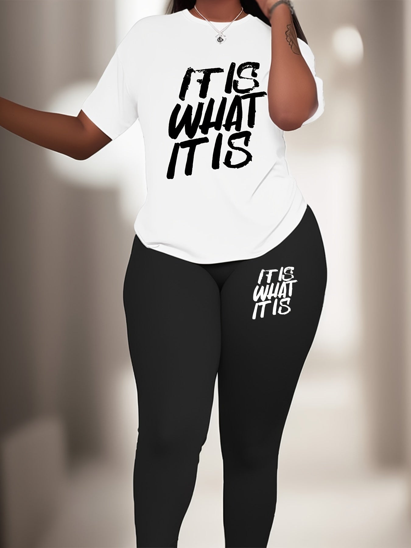 Plus Size Sports Set with slogan print. Polyester knit fabric with elastane for medium stretch. Crew neck activewear lash set.