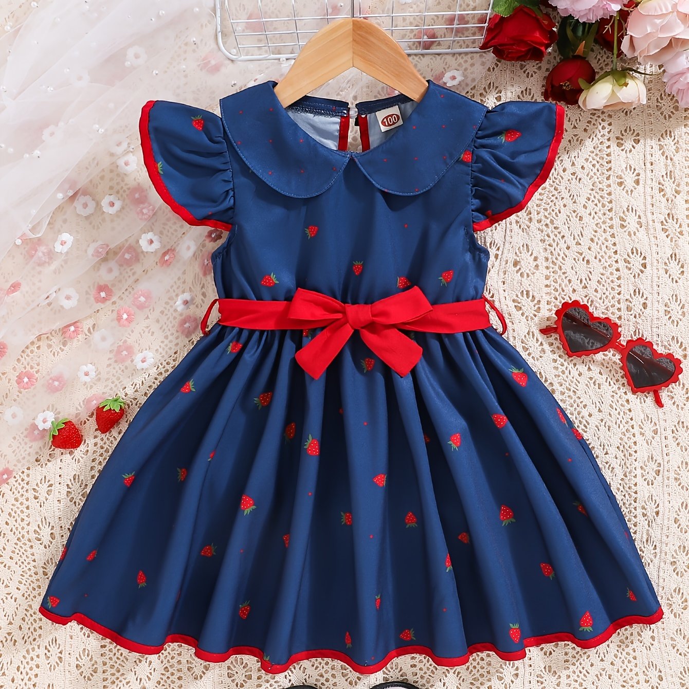 Girls' sleeveless strawberry print dress with ruffle hem, red belt - casual polyester, machine washable - ideal for summer.