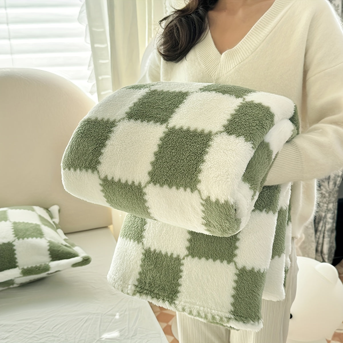 Soft, comfortable Cozy Traditional Checkered Edge Fleece Blanket suitable for all seasons. This multi-purpose blanket is machine washable and perfect for travel or office use.