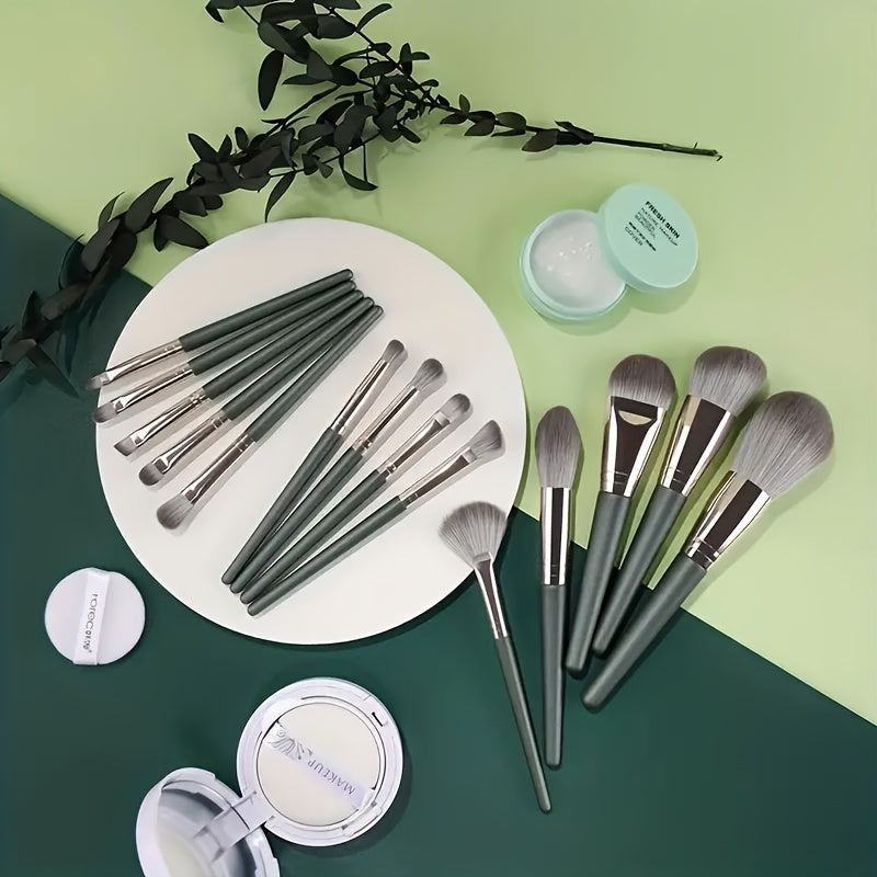 14-piece professional makeup brush set with soft and fluffy silvery/green synthetic hair, ideal for foundation, eyeshadow, eyebrow, and eyeliner application.