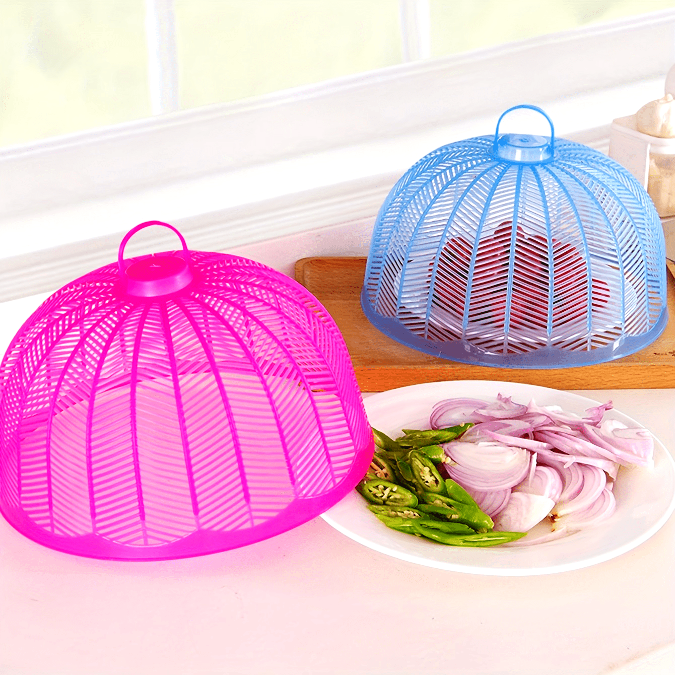 Set of 3 plastic food covers with colorful mesh screens for outdoor use. Keep flies, bugs, and dust away from your plates and bowls during picnics, parties, and in the kitchen.