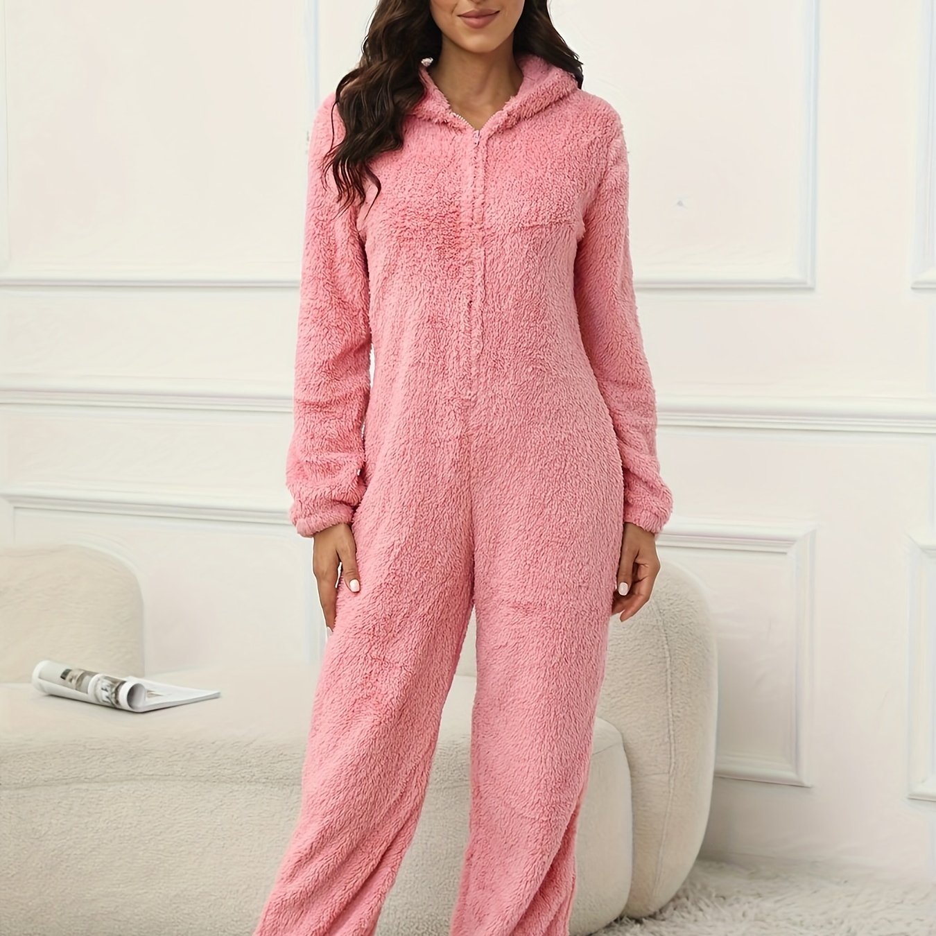 Hooded lounge jumpsuit with fuzzy fabric, zippered front, perfect for women's loungewear and sleepwear.