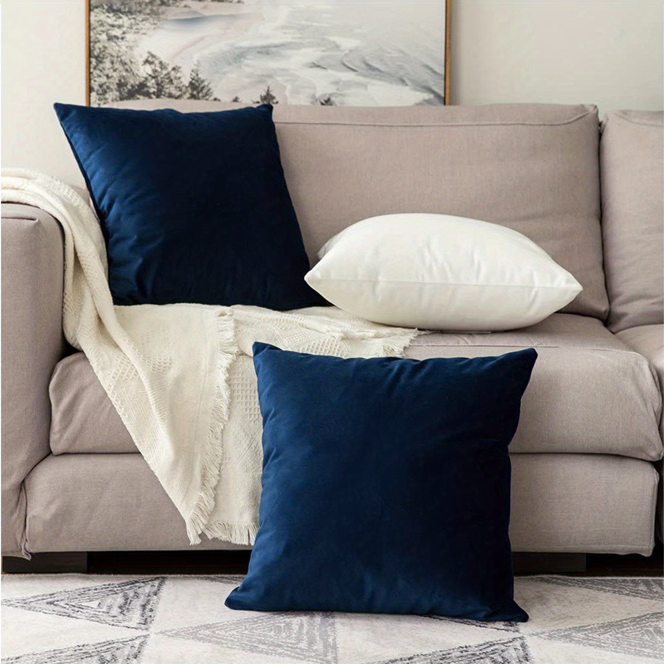 Luxurious dark blue chenille throw pillow cover with contemporary style and stain-resistant features. Made of 100% polyester with a zippered closure. Hand wash only for cozy living room decor.