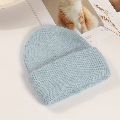 Soft knit beanie in candy colors for women, perfect for casual wear in autumn and winter.