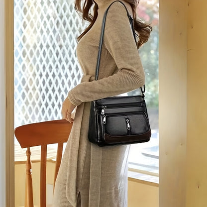 New crossbody shoulder bag with multiple layers and random zipper direction.