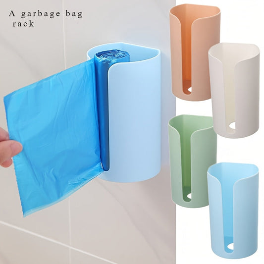 Wall-mounted garbage bag dispenser for easy organization and storage of trash bags. No nails required. Perfect for kitchen and bathroom accessories. Made of non-food contact plastic.