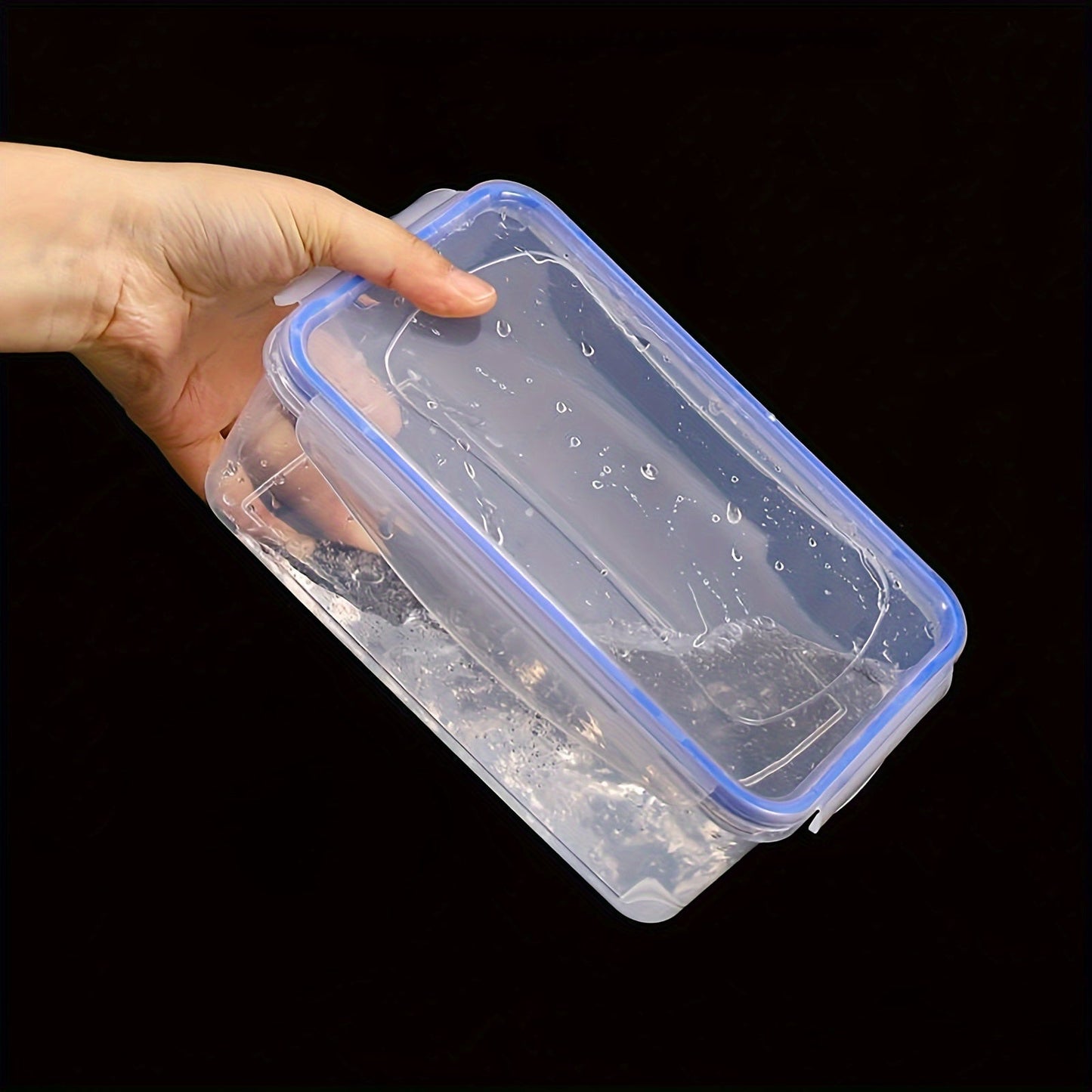 Transparent plastic food storage box with moisture-proof and airtight seal, ideal for storing grains and other foods in the kitchen refrigerator. This large container is microwave safe and thickened for durability, making it a must-have accessory for