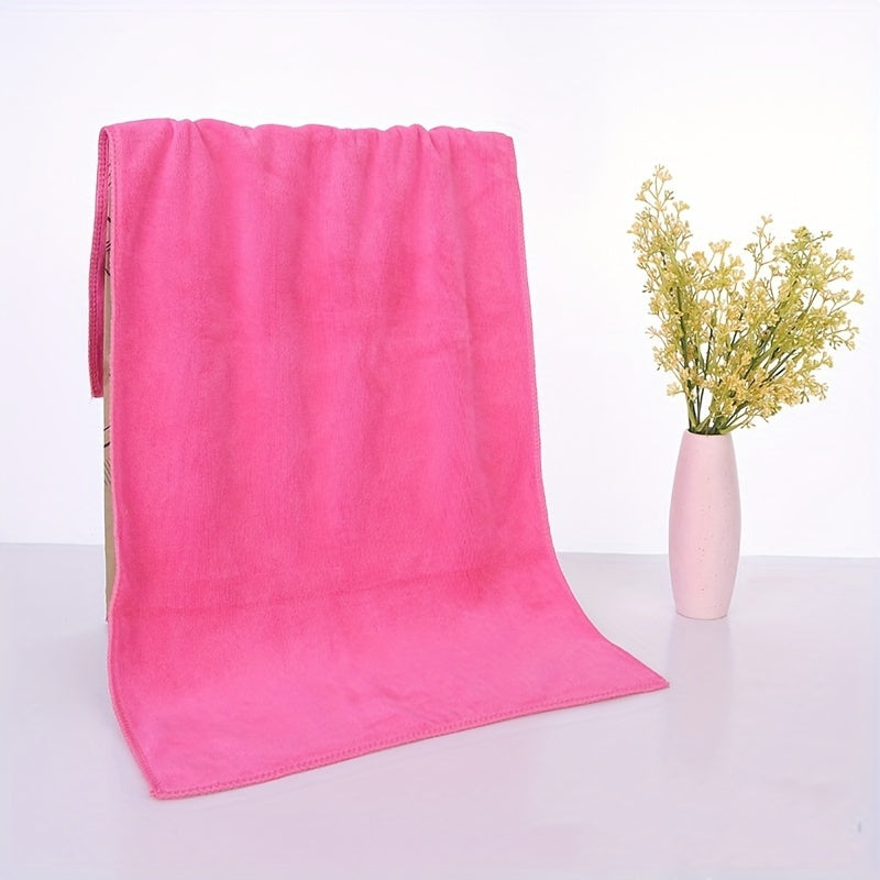 Soft microfiber bath towel with quick dry and absorbent features for use at home or in the spa, featuring a modern cloud pattern design.