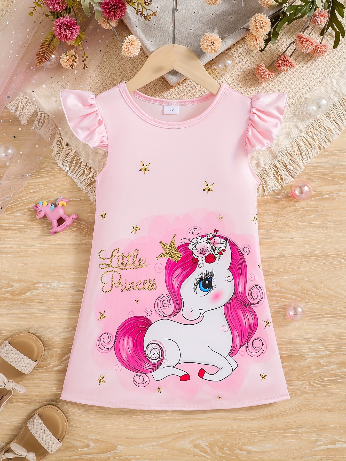 Girls' cute unicorn dress with flutter trim, perfect for spring and summer outings