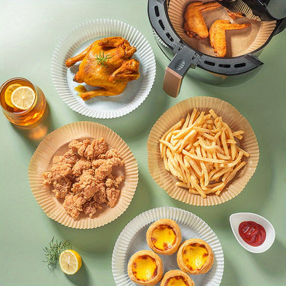 70 pieces of non-stick air fryer liners measuring 16.0cm, perfect for baking, cooking, and microwave use. These disposable paper bowls are oil and grease resistant, making them essential kitchen accessories.