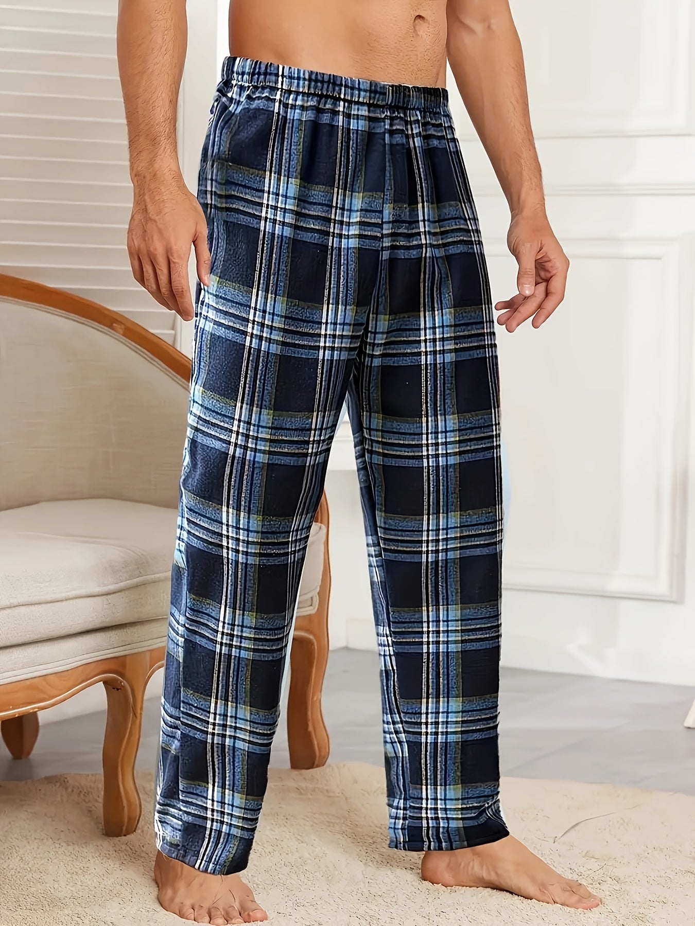 Comfortable men's sleep pants with tartan pattern, elastic waist, and pockets. Made from 95% polyester and 5% spandex, lightweight and soft. Suitable for all seasons.