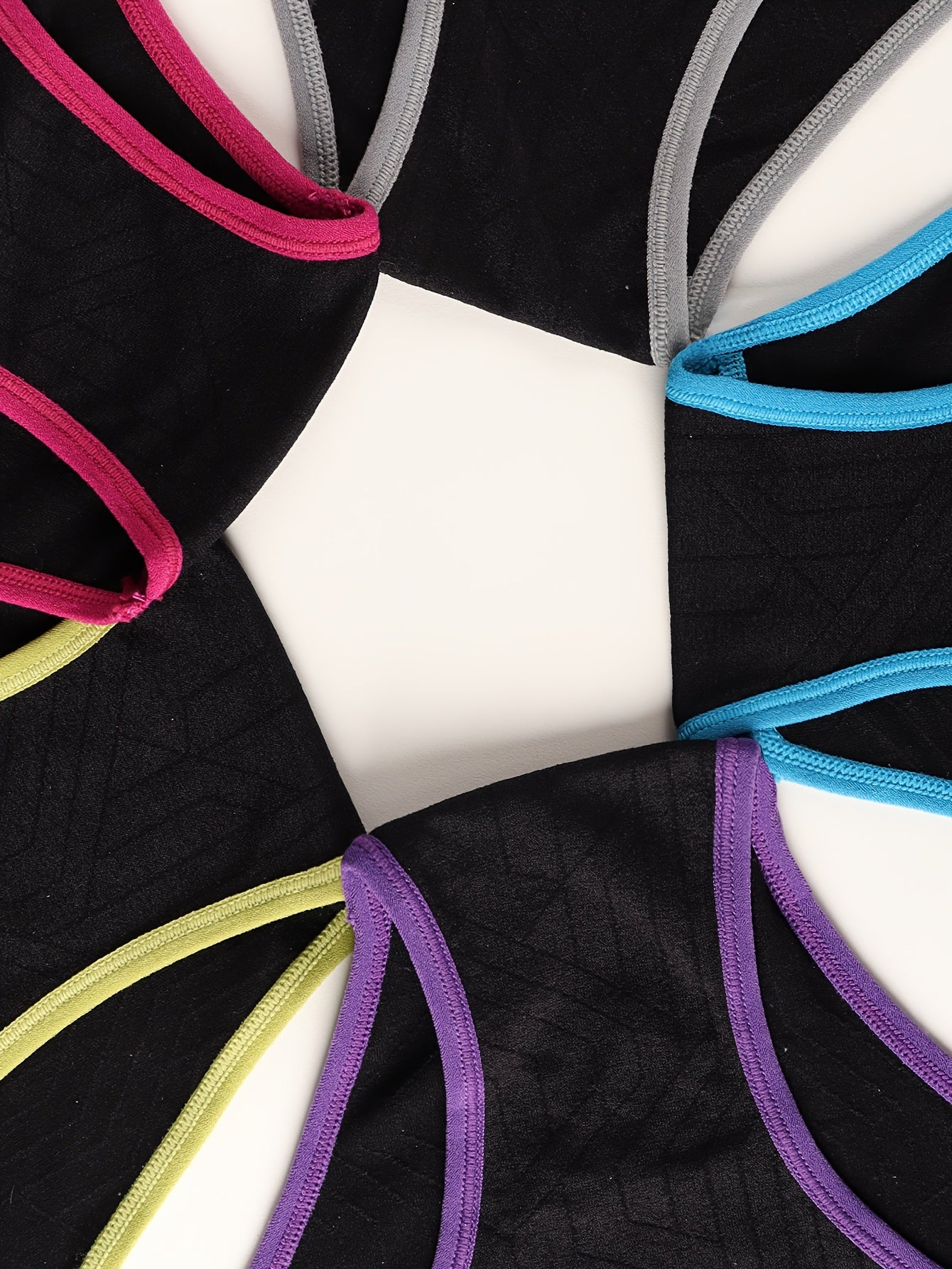 10 low-rise women's briefs: soft, stretchy nylon blend with colorblock design.