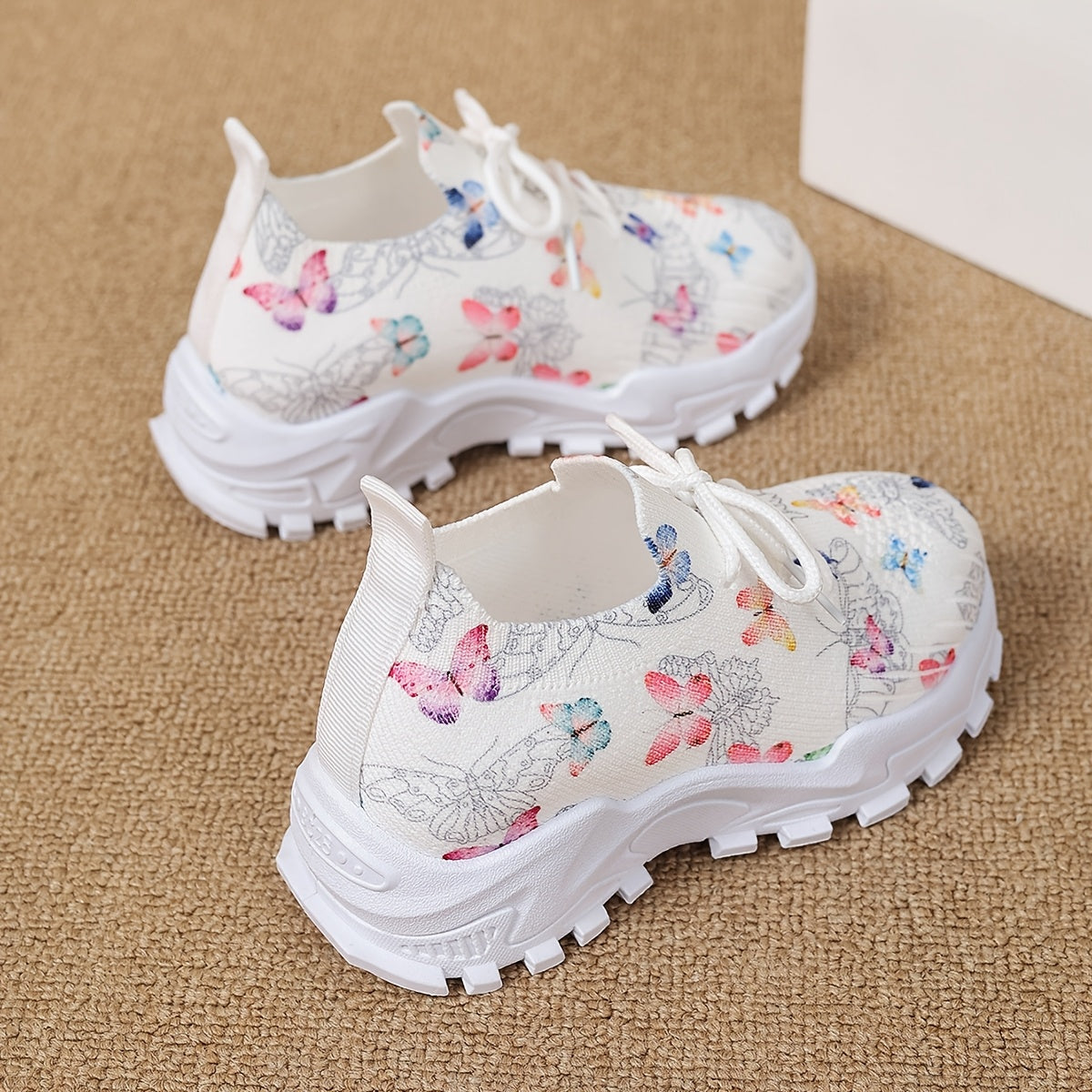 Stylish butterfly patterned running shoes for kids, with comfortable non-slip soles for outdoor sports.