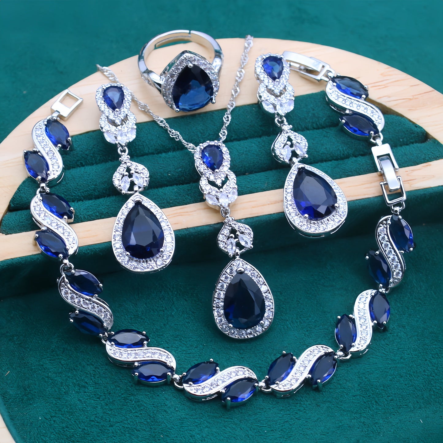 Sophisticated Copper Jewelry Set featuring Synthetic Blue Gemstones, Platinum-Plated Necklace, Ring, Earrings, and Bracelet. Hypoallergenic and suitable for both everyday wear and special occasions. A perfect gift for Valentine's Day. (5-piece Set)