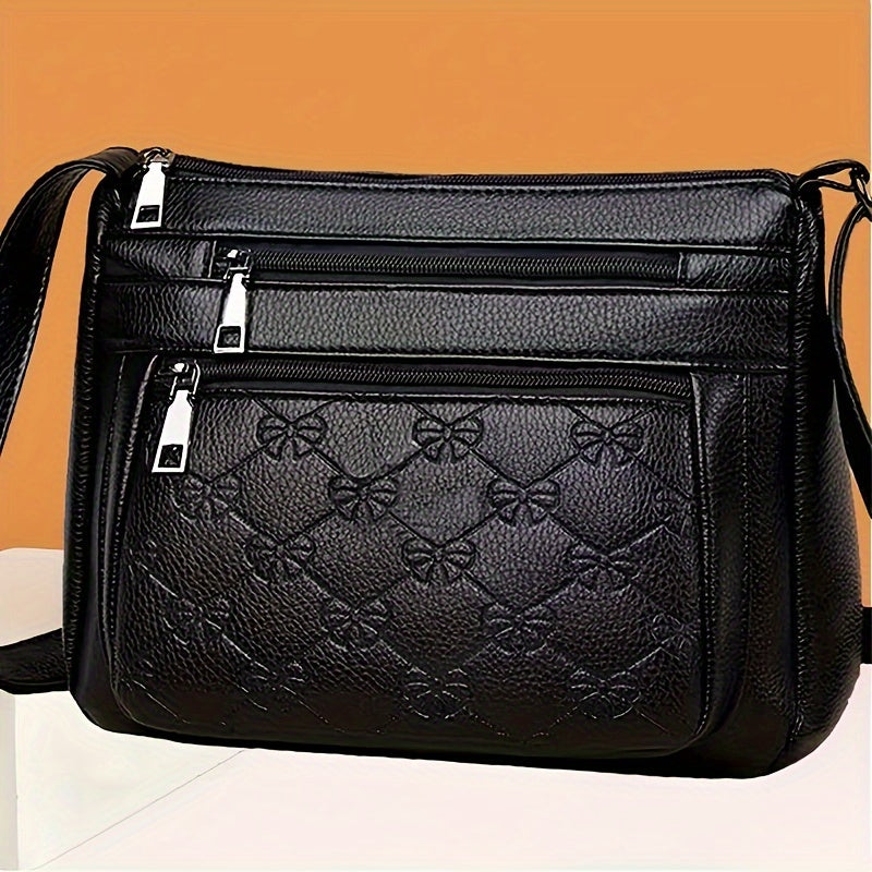 Casual nylon messenger bag with tassel and adjustable strap, perfect for daily commute.