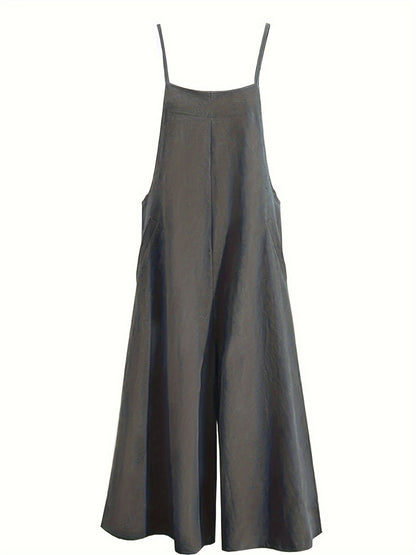 Wide leg jumpsuit with spaghetti straps, sleeveless with pockets, versatile women's clothing.