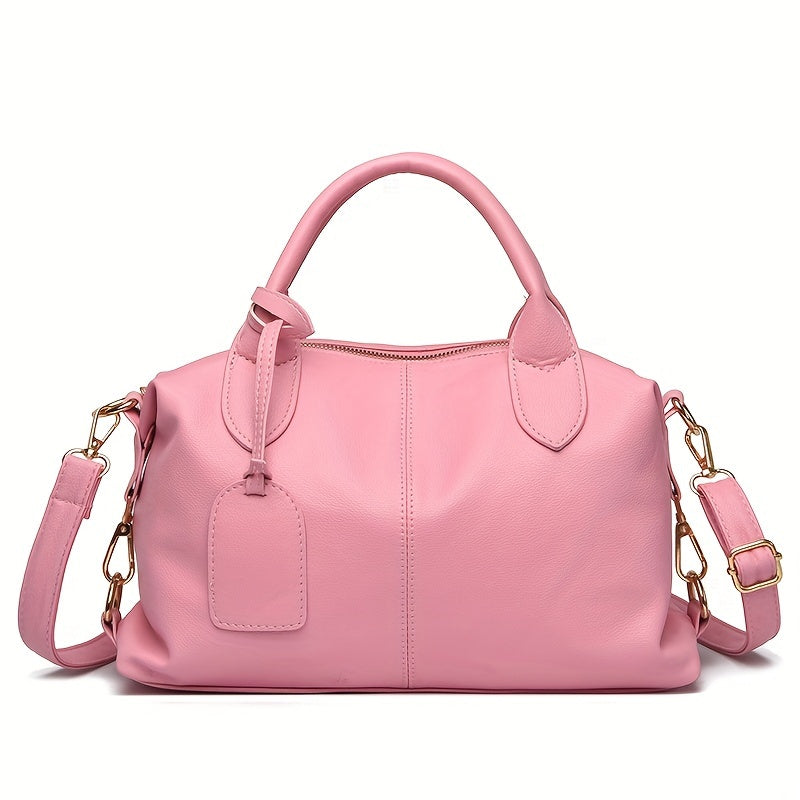 Stylish shoulder bag with removable strap and zip closure, perfect for everyday use.