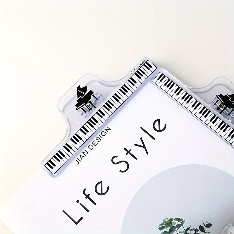 Stylish and durable transparent piano sheet music clips with staff notation. Perfect for organizing piano scores and sheet music. Available in black and clear options. Secure sheet grip.