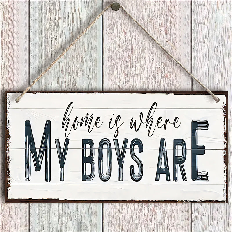 Wooden sign with the words "Home Is Where My Boys Are," a delightful gift idea for a new mom or Mother's Day. This farmhouse-style wall decor is perfect for the bedroom and adds a touch of shabby chic charm. It's a wonderful keepsake and a lovely