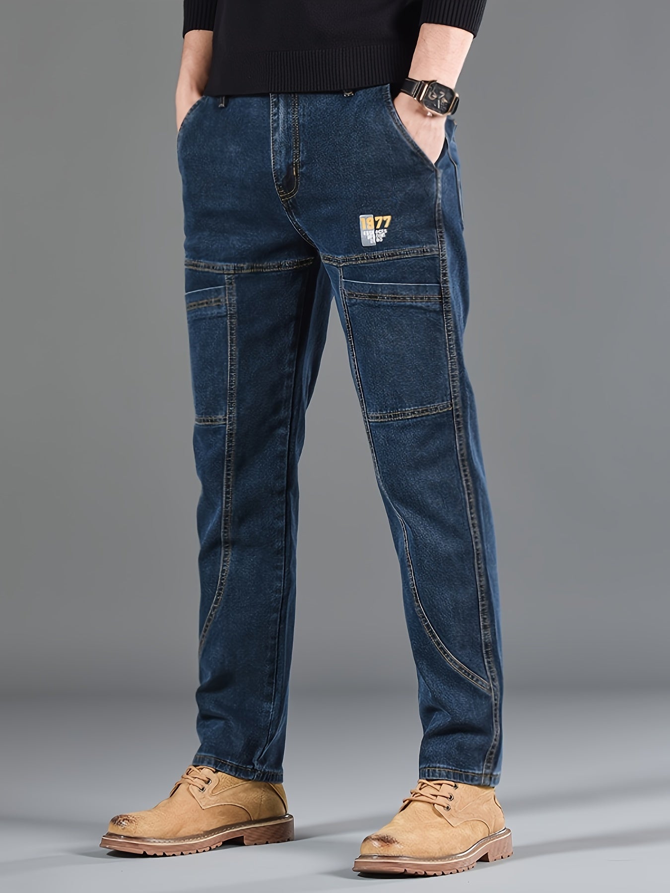 Men's regular fit denim jeans made of 70% cotton, 28% polyester, and 1.3% elastane with washed print, slight stretch, and 300g/m² woven fabric. Suitable for all seasons.