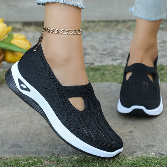 Breathable knit slip-on sneakers for women, with cut-out design and tassel detail in black