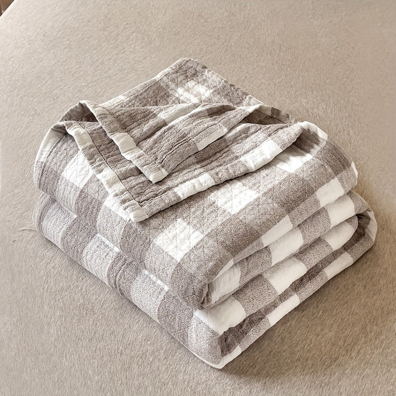 High-Quality Boho Checkered Lightweight Quilt made of 100% cotton with a 40s thread count. Features a neutral grey and white plaid design suitable for modern farmhouse and bohemian