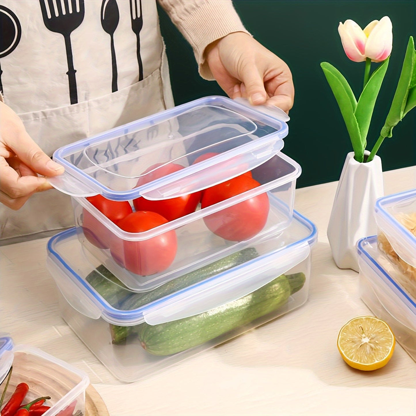 Transparent plastic food storage box with moisture-proof and airtight seal, ideal for storing grains and other foods in the kitchen refrigerator. This large container is microwave safe and thickened for durability, making it a must-have accessory for