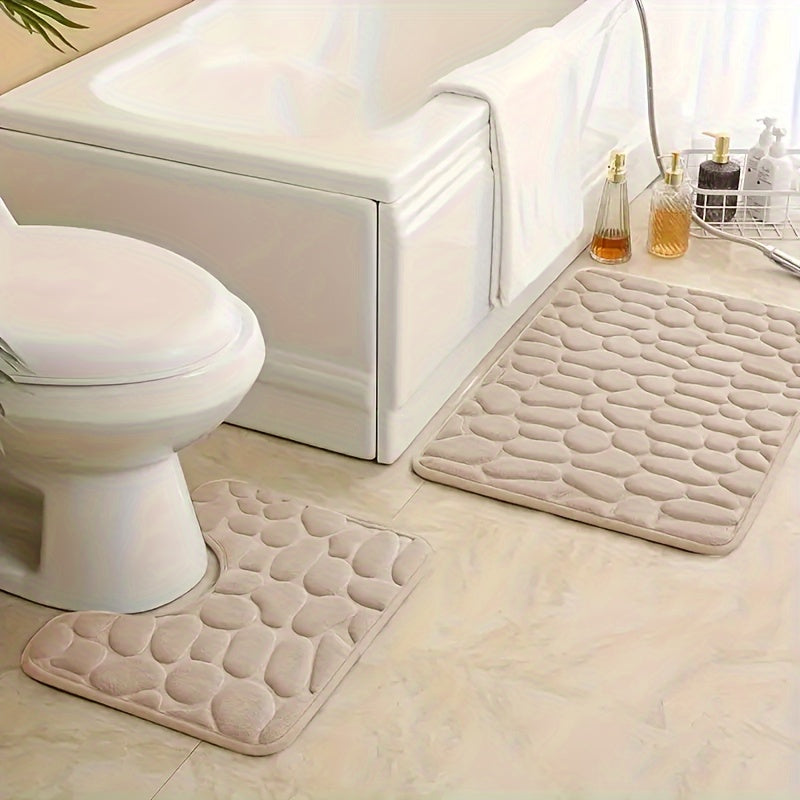 Soft and comfortable two-piece bathroom mat set with anti-slip, absorbent pebble memory design. Perfect for your toilet floor.