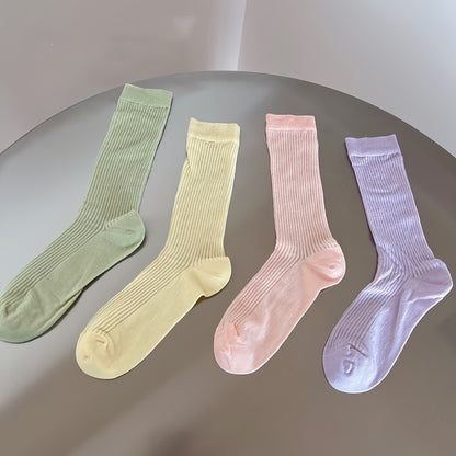 4 pairs of comfy mid-tube socks for women, with hollow out design for breathability.