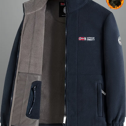 Men's fleece-lined jacket with embroidered detailing in black and gray, featuring a stand collar, zip-up closure, side pockets, and shaggy fleece fabric.