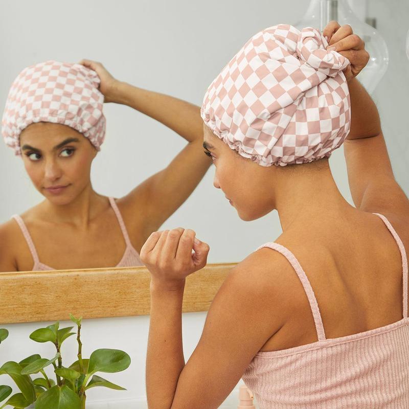 Experience the ultimate in luxury with our satin shower cap from Cline. Featuring an adjustable fit, this cap requires no electricity, making it perfect for outdoor use. Enjoy comfortable and durable hair protection with our premium shower cap.