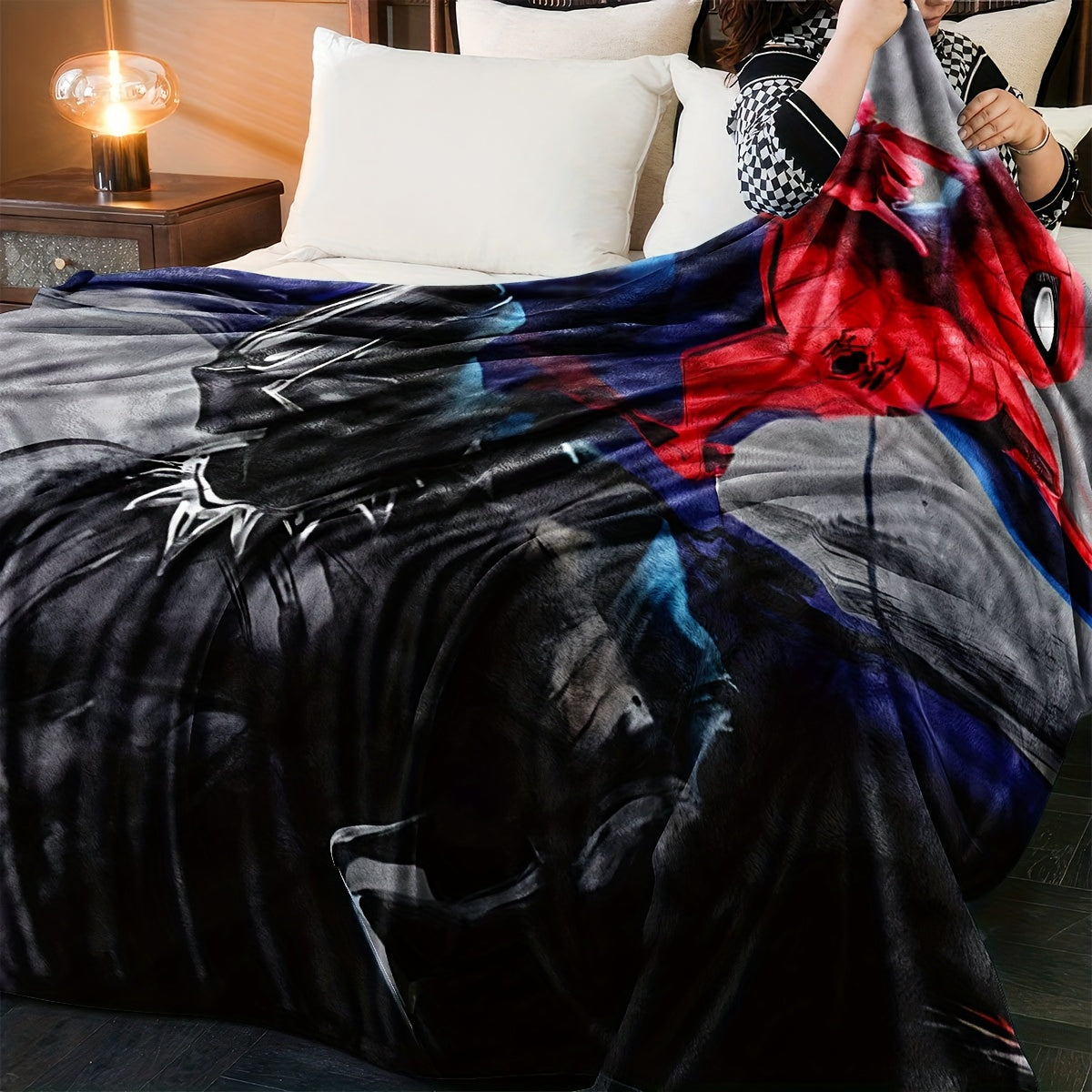 Experience the thrilling battle between Spider-Man and Black Panther on our stylish and detailed red, black, and gray interwoven blankets. Elevate your home with modern and fashionable accessories that bring your superhero dreams to life. Our range of