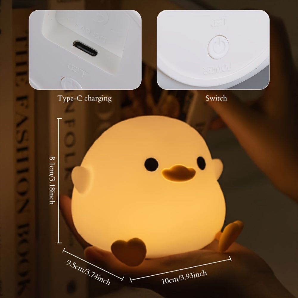 Cute duck-shaped touch control night light with RGB color changing, soft silicone bedside lamp, USB-C rechargeable desk light, perfect gift for any room.