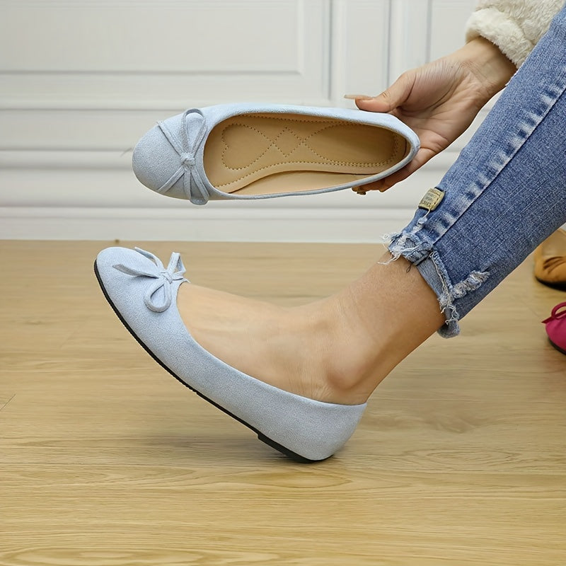 Stylish ballet flats for women with bowknot detail and soft sole, suitable for all seasons.