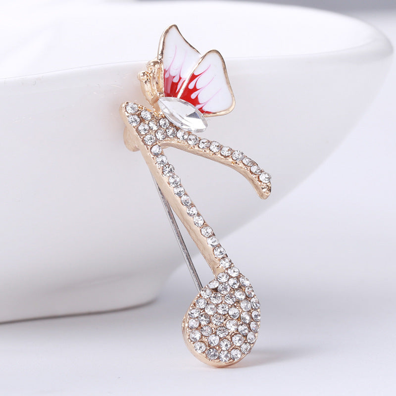 SKEDS Elegant Rhinestone Music Note Butterfly Brooch: Ayollar va Erkaklar uchun noyob moda pin