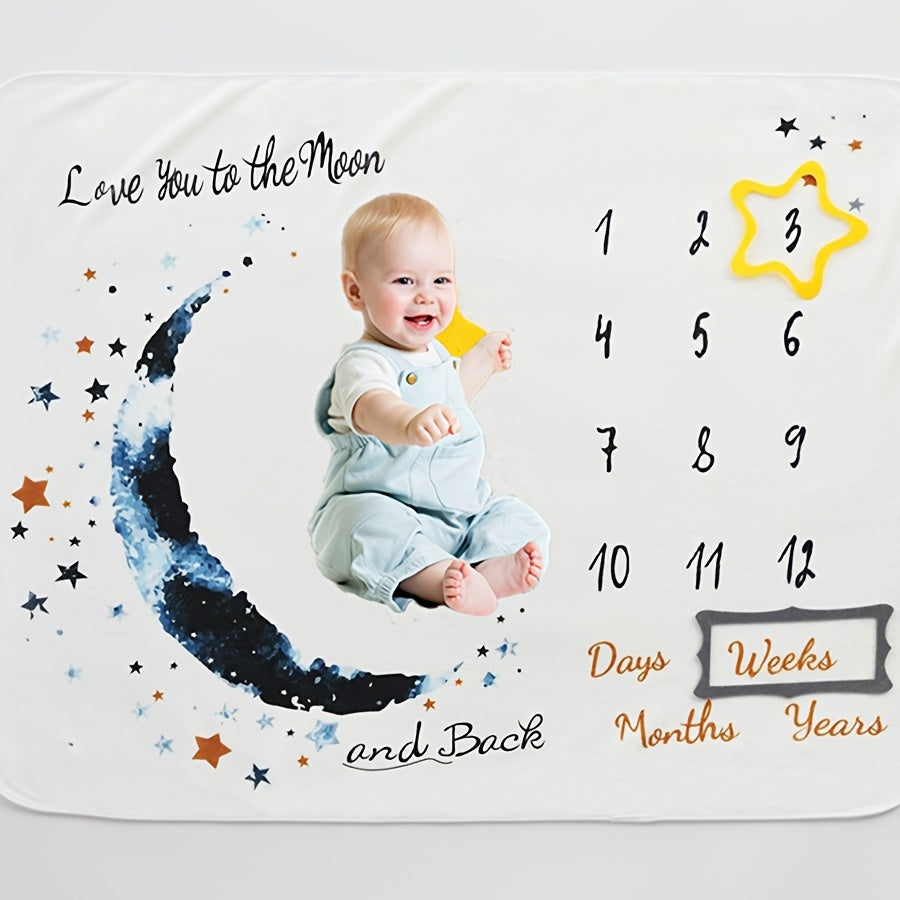 Moon-inspired milestone blanket for boys, perfect for capturing their first year growth progress. Measures 152.4cm x 101.6cm, made of machine washable polyester. Keep track of monthly milestones with this unique calendar design.