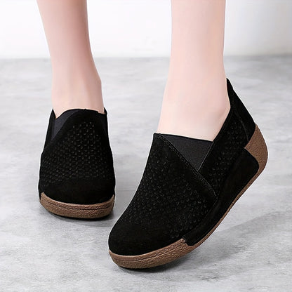 Breathable slip-on sneakers for women with hollow design, round toe, and non-slip PU sole.