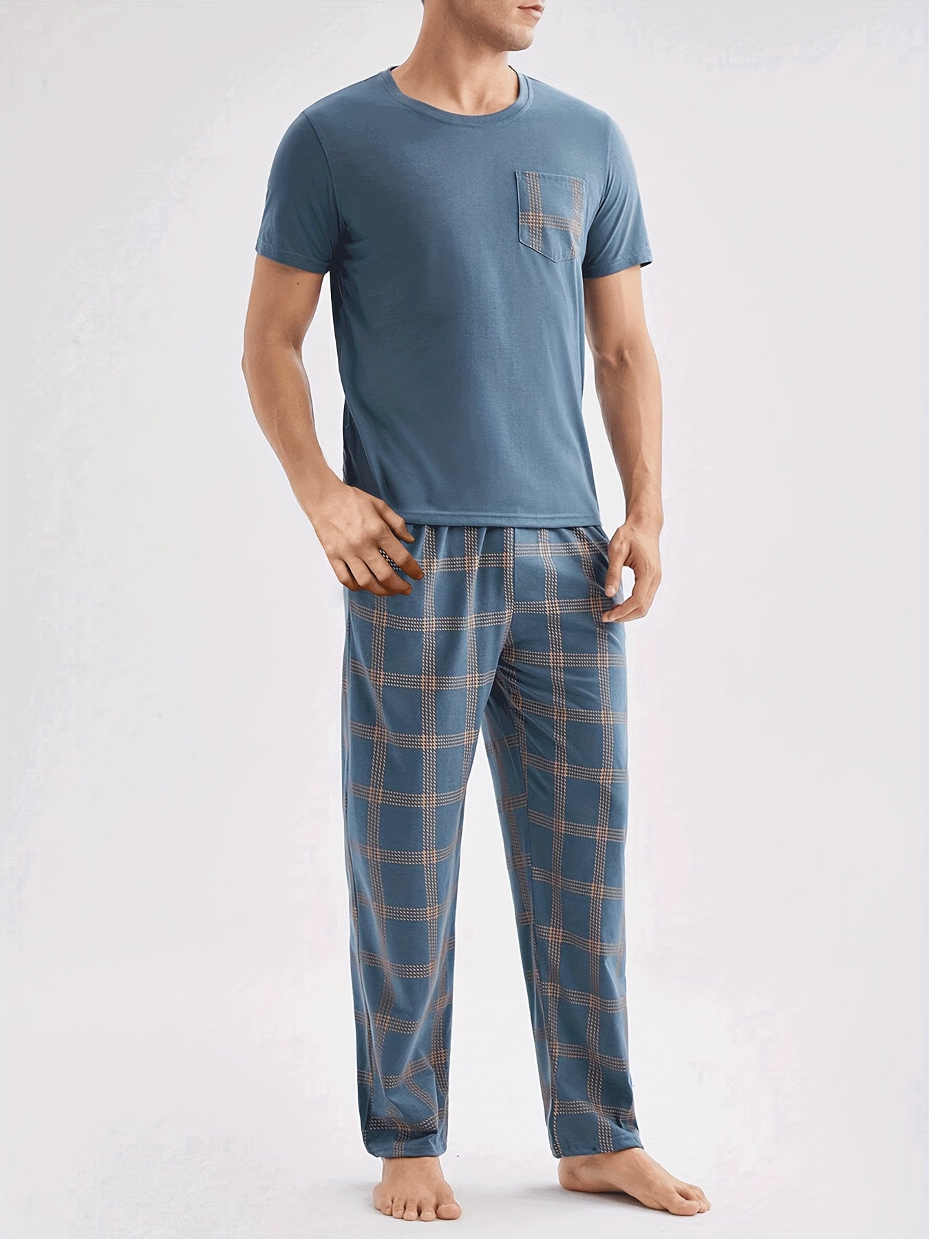 Men's casual blue short-sleeve top and plaid long pants set made of soft polyester for loungewear at home or out.