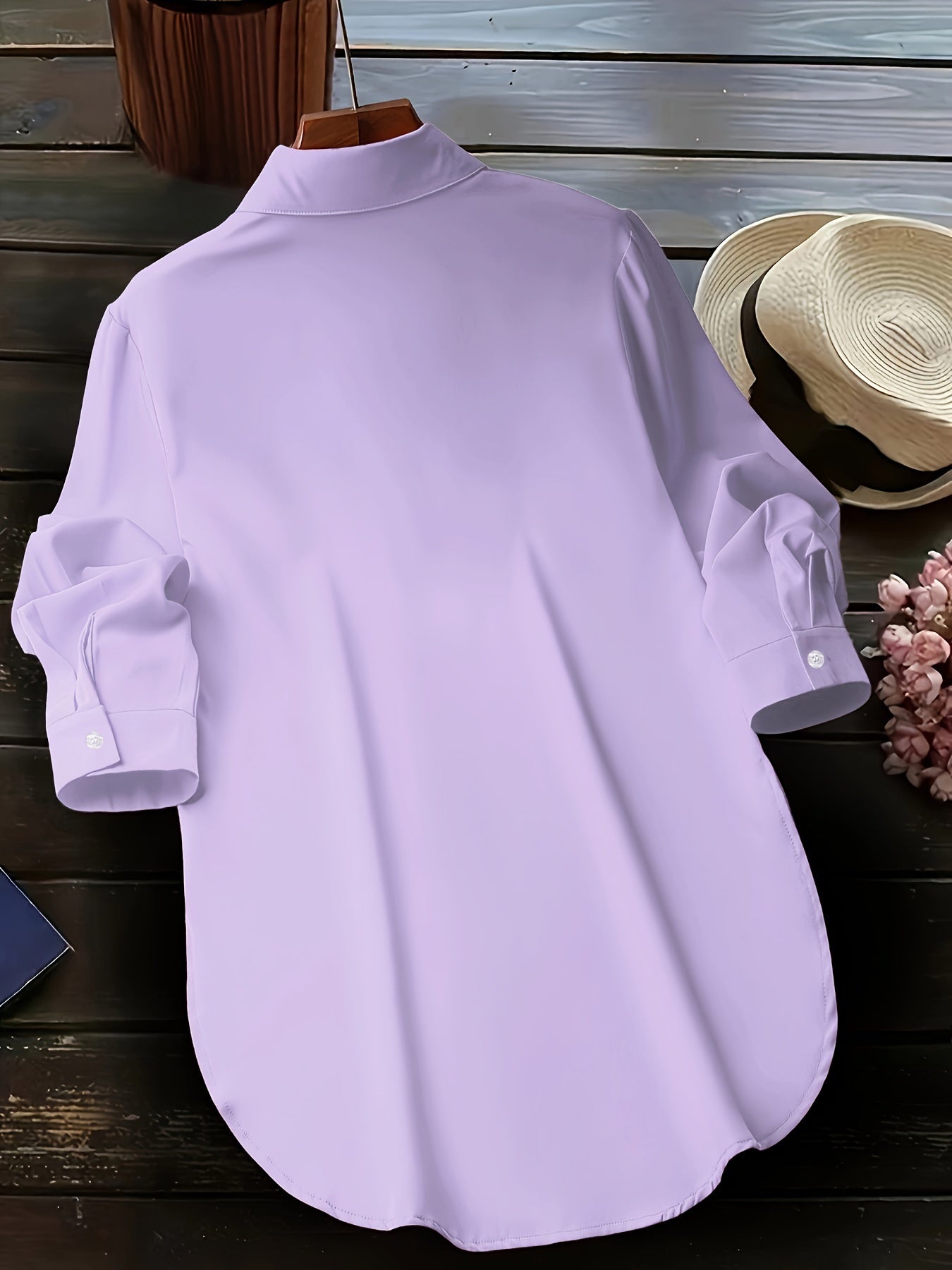 Curved hem blouse for spring, button front and collared, plus size.