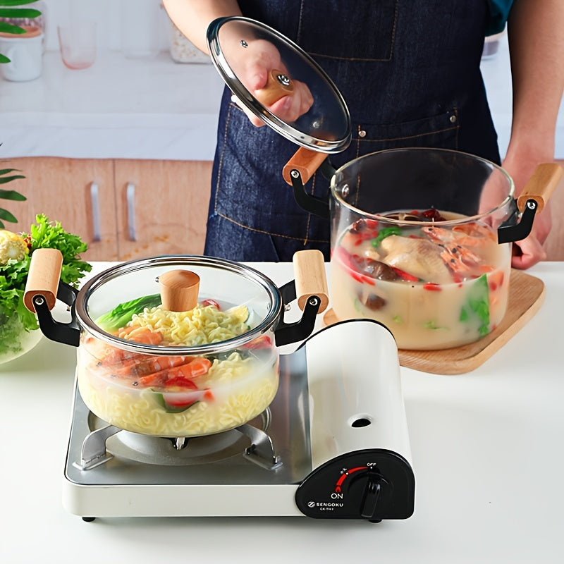 This soup pot with a lid and double wooden handle is perfect for cooking a variety of dishes. Made of safe glass, this household kitchen glass cooker is ideal for making pasta, noodles, soup, juice, and milk. Complete your kitchen supplies with this