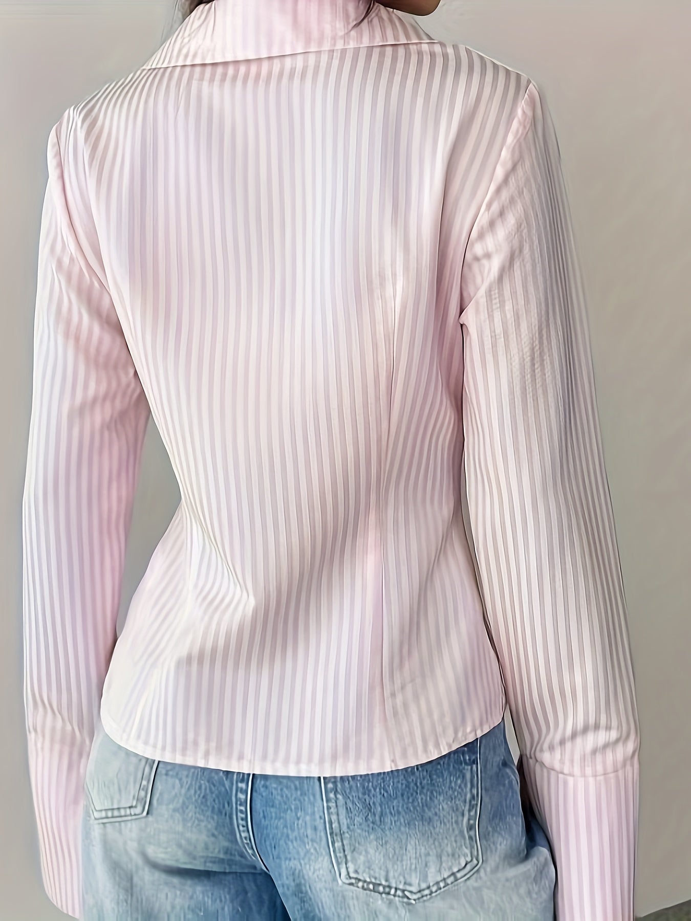 Women's V-neck striped button-up shirt with long sleeves made of woven polyester for spring/fall.