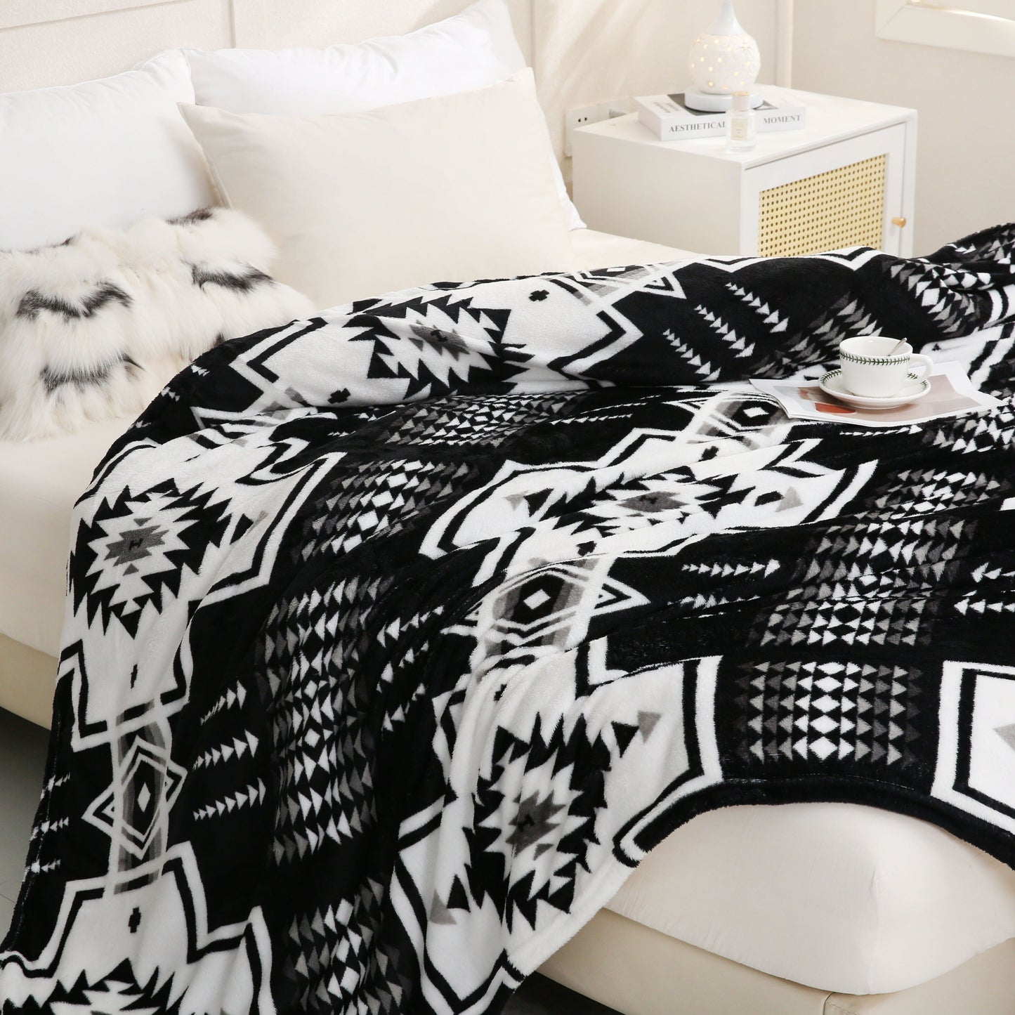 A multipurpose gift blanket for all seasons, this ethnic style geometric print flannel blanket is perfect for couches, sofas, offices, beds, camping, and travel. Measuring 1 piece and weighing 200gsm, this soft and warm throw blanket is perfect for