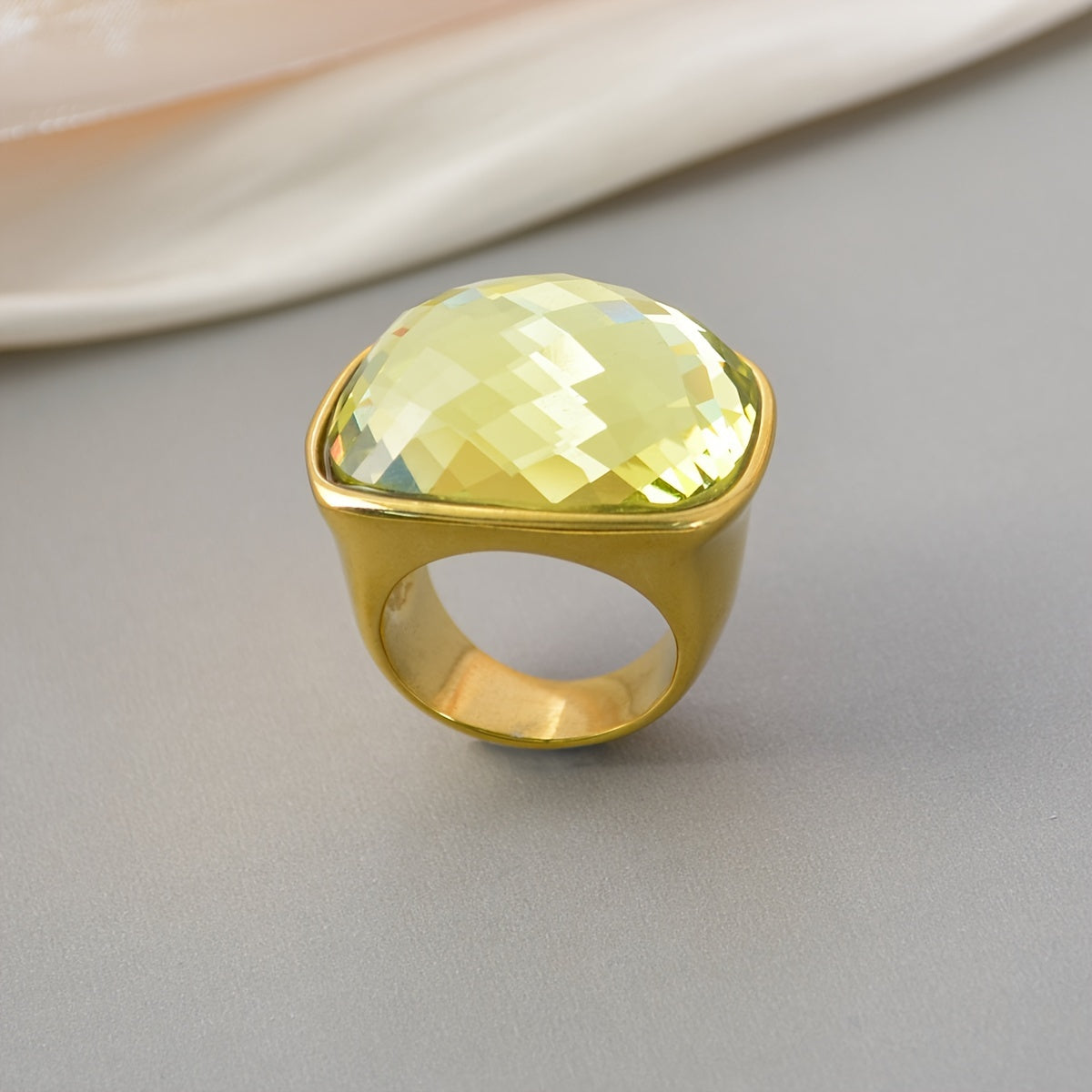 Elevate Your Look with our 1PC Hip Hop Luxury Style Square Gemstone Ring! This elegant statement ring features a large stone and is perfect for daily wear or special occasions. Made with 18K plated zirconia inlay and stainless steel band, this Mardi Gras