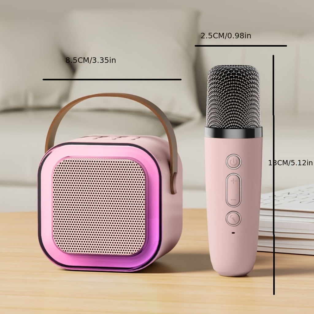 Portable karaoke speaker with light, handheld microphone included. USB rechargeable, ideal for home, car, camping, and parties. Pink/black color.